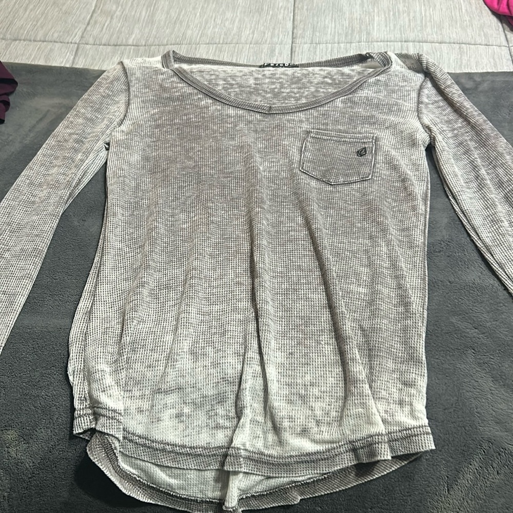 Grey colored distressed volcom long sleeved v-neck shirt size small
